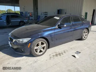 2015 BMW 4 Series 428i xDrive with VIN WBA4C9C54FD330243, listed as a Copart auction lot 48339095 with 85,753 mi miles and Salvage Title. Bid and sale history available at carsss.com. Image 1.