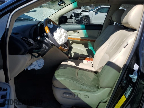 2008 Lexus RX 400h with VIN JTJHW31UX82068789, listed as a Copart auction lot 47590435 with 191,367 mi miles and Salvage Title. Bid and sale history available at DreamBid. Image 7.