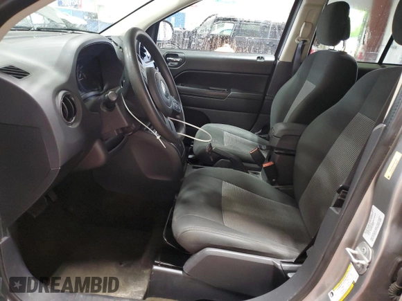 2016 Jeep Compass Sport with VIN 1C4NJCBA8GD611987, listed as a Copart auction lot 62491265 with 158,662 mi miles and Salvage title. Bid and sale history available at DreamBid. Image 7.