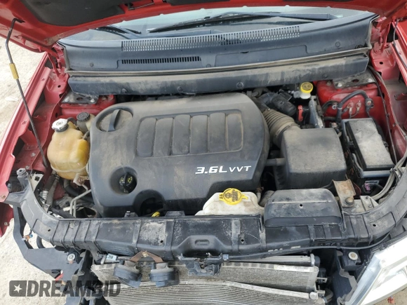 2012 Dodge Journey SXT with VIN 3C4PDDBG4CT289718, listed as a Copart auction lot 61219365 with 159,254 mi miles and Salvage title. Bid and sale history available at DreamBid. Image 12.