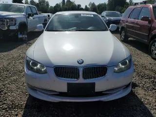 2011 BMW 3 Series 335i xDrive with VIN WBAKF9C51BE620023, listed as a Copart auction lot 60287515 with 123,353 mi miles and Salvage title. Bid and sale history available at DreamBid. Image 5.