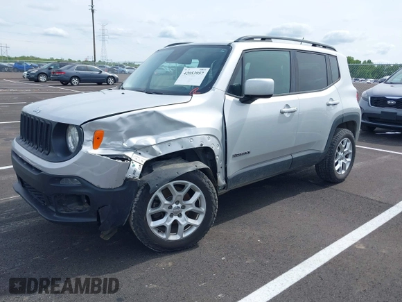 2017 Jeep Renegade Latitude z VIN ZACCJBBB6HPG40367, wystawiony jako IAAI lot #42053957 z przebiegiem 105 893 mil mil oraz . Historia ofert i sprzedaży dostępna na DreamBid. Obrazek 2.