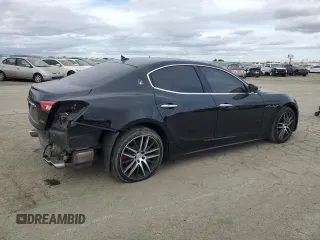 2017 Maserati Ghibli z VIN ZAM57XSA6H1217313, wystawiony jako Copart lot #46475785 z przebiegiem 51 798 mil mil oraz Szkoda całkowita • Salvage title. Historia ofert i sprzedaży dostępna na DreamBid. Obrazek 3.