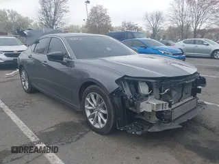 2023 Acura TLX z VIN 19UUB5F30PA006879, wystawiony jako IAAI lot #42006899 z przebiegiem 35 379 mil mil oraz . Historia ofert i sprzedaży dostępna na DreamBid. Obrazek 1.