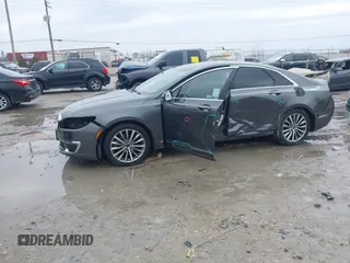 2017 Lincoln MKZ Hybrid Premiere with VIN 3LN6L5KU6HR609891, listed as a IAAI auction lot 41712359 with 112,349 mi miles. Bid and sale history available at carsss.com. Image 6.