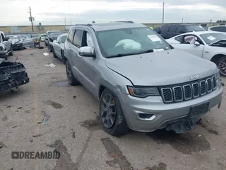 2017 Jeep Grand Cherokee Limited z VIN 1C4RJEBG3HC920520, wystawiony jako IAAI lot #41909976 z przebiegiem 165 872 mil mil oraz . Historia ofert i sprzedaży dostępna na DreamBid. Obrazek 1.