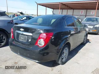 2014 Chevrolet Sonic LT z VIN 1G1JC5SH5E4224501, wystawiony jako IAAI lot #42275218 z przebiegiem 119 370 mil mil oraz . Historia ofert i sprzedaży dostępna na DreamBid. Obrazek 4.