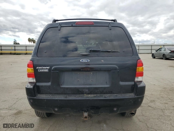 2004 Ford Escape Limited with VIN 1FMCU04134KA61949, listed as a Copart auction lot 47377455 with 205,480 mi miles and Salvage Title. Bid and sale history available at carsss.com. Image 6.