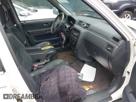 2000 Honda CR-V SE z VIN JHLRD1870YS022201, wystawiony jako IAAI lot #42527115 z przebiegiem 232 081 mil mil oraz . Historia ofert i sprzedaży dostępna na DreamBid. Obrazek 5.