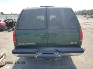 1998 GMC Suburban z VIN 3GKFK16R1WG511256, wystawiony jako Copart lot #77568484 z przebiegiem 301 116 mil mil oraz Czysty tytuł • Clean title. Historia ofert i sprzedaży dostępna na DreamBid. Obrazek 6.