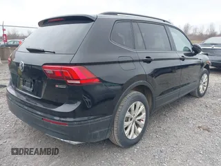 2019 Volkswagen Tiguan S with VIN 3VV0B7AX9KM019775, listed as a IAAI auction lot 41897497 with 61,691 mi miles and . Bid and sale history available at DreamBid. Image 4.
