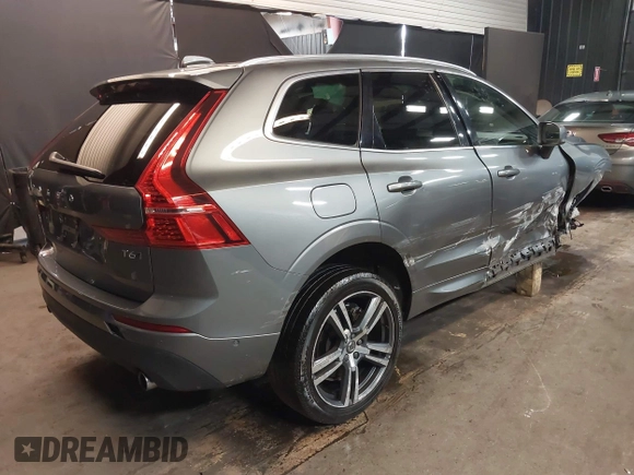 2019 Volvo XC60 Momentum with VIN LYVA22RK4KB229432, listed as a IAAI auction lot 42419336 with 67,179 mi miles and . Bid and sale history available at DreamBid. Image 4.