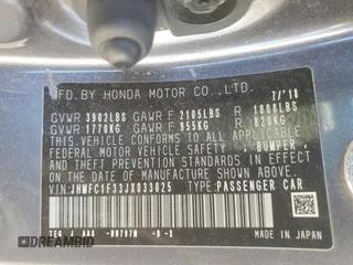 2018 Honda Civic EX-T z VIN JHMFC1F33JX033025, wystawiony jako Copart lot #46920555 z przebiegiem 100 673 mil mil oraz Szkoda całkowita • Salvage title. Historia ofert i sprzedaży dostępna na DreamBid. Obrazek 12.