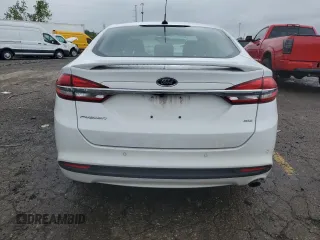 2017 Ford Fusion SE z VIN 3FA6P0H72HR241423, wystawiony jako Copart lot #56777945 z przebiegiem 105 223 mil mil oraz Czysty tytuł • Clean title. Historia ofert i sprzedaży dostępna na DreamBid. Obrazek 6.