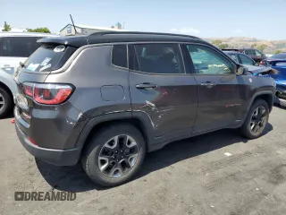 2017 Jeep Compass Trailhawk with VIN 3C4NJDDB8HT674627, listed as a Copart auction lot 59790325 with 66,349 mi miles and Salvage title. Bid and sale history available at DreamBid. Image 3.