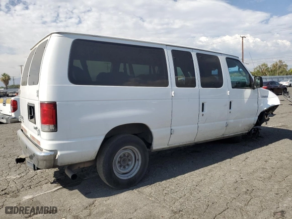 2014 Ford Econoline Wagon XL with VIN 1FBNE3BLXEDA14976, listed as a Copart auction lot 65948404 with 285,655 mi miles and Salvage Title. Bid and sale history available at carsss.com. Image 3.