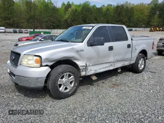 2005 Ford F-150 XLT with VIN 1FTRW12WX5FA79128, listed as a Copart auction lot 51963585 with 169,045 mi miles and Salvage Title. Bid and sale history available at carsss.com. Image 1.