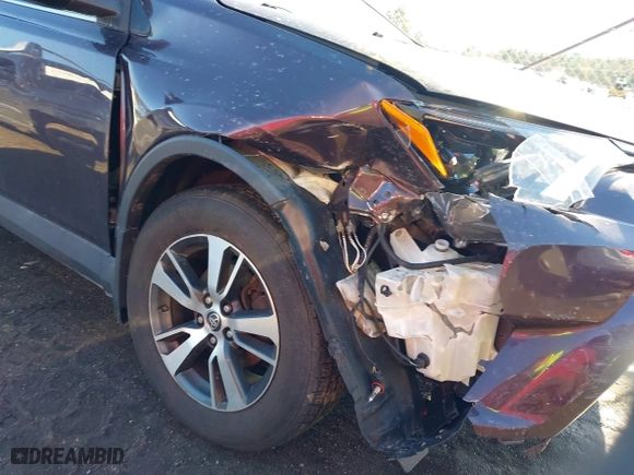 2018 Toyota RAV4 XLE with VIN 2T3RFREV6JW839890, listed as a IAAI auction lot 41654804 with 72,038 mi miles. Bid and sale history available at carsss.com. Image 18.