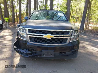 2015 Chevrolet Suburban LT with VIN 1GNSCJKC1FR264255, listed as a IAAI auction lot 42065176 with 115,861 mi miles. Bid and sale history available at carsss.com. Image 12.