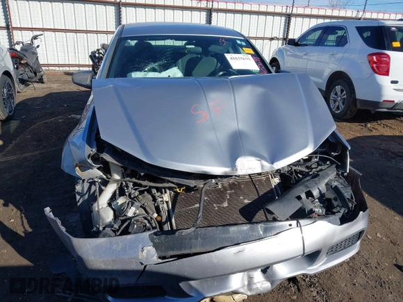 2014 Dodge Avenger SE with VIN 1C3CDZAB7EN144102, listed as a IAAI auction lot 41635691 with 201,428 mi miles and . Bid and sale history available at DreamBid. Image 12.