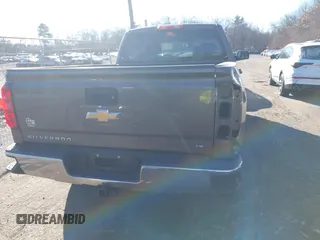 2014 Chevrolet Silverado 1500 LT with VIN 1GCVKREC9EZ300548, listed as a IAAI auction lot 41318981 with 237,113 mi miles and . Bid and sale history available at DreamBid. Image 17.