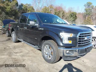 2015 Ford F-150 XLT with VIN 1FTEW1EG6FKF22211, listed as a IAAI auction lot 41753438 with 130,019 mi miles. Bid and sale history available at carsss.com. Image 1.