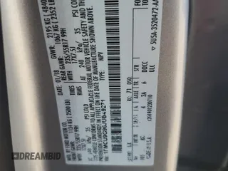 2018 Ford Escape SE z VIN 1FMCU9G96JUB49271, wystawiony jako Copart lot #50553205 z przebiegiem 91 123 mil mil oraz Szkoda całkowita • Salvage title. Historia ofert i sprzedaży dostępna na DreamBid. Obrazek 13.