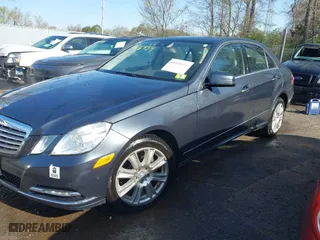 2013 Mercedes-Benz E-Class E 350 Luxury with VIN WDDHF8JB0DA707640, listed as a IAAI auction lot 41916454 with 104,469 mi miles. Bid and sale history available at carsss.com. Image 2.