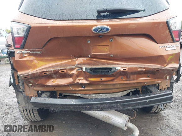 2017 Ford Escape Titanium with VIN 1FMCU0JD3HUB20846, listed as a IAAI auction lot 42182260 with 28,610 mi miles and . Bid and sale history available at DreamBid. Image 6.
