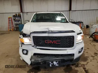 2018 GMC Canyon 4WD Denali z VIN 1GTG6EEN6J1171037, wystawiony jako Copart lot #52521865 z przebiegiem 99 931 mil mil oraz Szkoda całkowita • Salvage title. Historia ofert i sprzedaży dostępna na DreamBid. Obrazek 5.