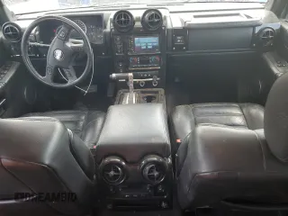 2007 Hummer H2 SUV z VIN 5GRGN23UX7H101776, wystawiony jako Copart lot #56337975 z przebiegiem 176 599 mil mil oraz Szkoda całkowita • Salvage title. Historia ofert i sprzedaży dostępna na DreamBid. Obrazek 8.