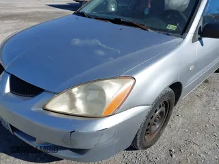2004 Mitsubishi Lancer ES with VIN JA3AJ26E64U035168, listed as a IAAI auction lot 41625806 with 176,232 mi miles. Bid and sale history available at carsss.com. Image 16.