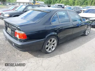 1997 BMW 5 Series 540i z VIN WBADE5324VBV92704, wystawiony jako IAAI lot #42305703 z przebiegiem 202 371 mil mil oraz . Historia ofert i sprzedaży dostępna na DreamBid. Obrazek 4.