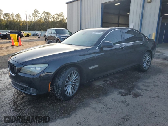 2011 BMW 7 Series 740i with VIN WBAKA4C55BC612987, listed as a Copart auction lot 76607654 with 154,118 mi miles and Salvage Title. Bid and sale history available at carsss.com. Image 1.
