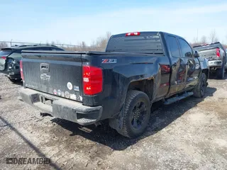 2017 Chevrolet Silverado 1500 LT with VIN 1GCVKREC1HZ285337, listed as a IAAI auction lot 41781910 with 136,895 mi miles. Bid and sale history available at carsss.com. Image 4.