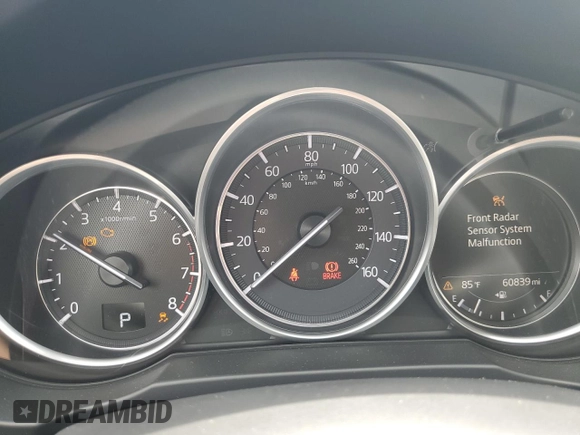 2018 Mazda CX-5 Grand Touring with VIN JM3KFADM8J0444455, listed as a Copart auction lot 59793055 with 60,839 mi miles and Salvage title. Bid and sale history available at DreamBid. Image 9.