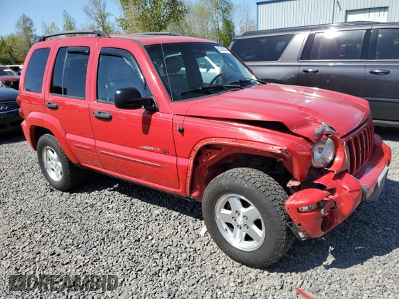 2002 Jeep Liberty Limited with VIN 1J8GL58K42W328443, listed as a Copart auction lot 52768345 with 218,459 mi miles and Salvage title. Bid and sale history available at DreamBid. Image 4.