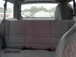 1998 Jeep Cherokee Sport with VIN 1J4FJ68S7WL275947, listed as a Copart auction lot 74333874 with 0 mi miles and Salvage Title. Bid and sale history available at carsss.com. Image 10.