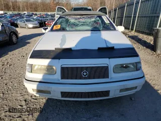 1993 Chrysler LeBaron z VIN 1C3XU4534PF654847, wystawiony jako Copart lot #84391684 z przebiegiem 129 520 mil mil oraz Szkoda całkowita • Salvage title. Historia ofert i sprzedaży dostępna na DreamBid. Obrazek 5.