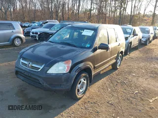 2004 Honda CR-V LX with VIN SHSRD784X4U207801, listed as a IAAI auction lot 41882897 with 246,541 mi miles and . Bid and sale history available at carsss.com. Image 17.
