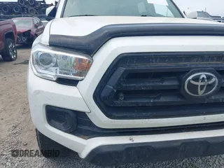 2022 Toyota Tacoma SR with VIN 3TYCZ5AN9NT098903, listed as a IAAI auction lot 42088505 with 93,000 mi miles and . Bid and sale history available at DreamBid. Image 6.