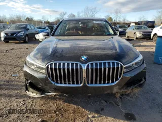 2020 BMW 7 Series 740i xDrive with VIN WBA7T4C04LCD18344, listed as a Copart auction lot 82823384 with Not provided miles and Salvage title. Bid and sale history available at DreamBid. Image 5.