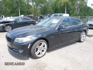 2011 BMW 5 Series 528i with VIN WBAFR1C58BC750449, listed as a IAAI auction lot 42083667 with 212,094 mi miles and . Bid and sale history available at carsss.com. Image 2.