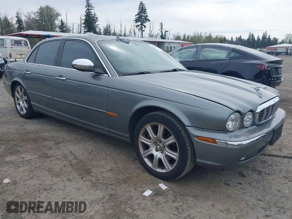 2004 Jaguar XJ with VIN SAJEA74C94SG10199, listed as a IAAI auction lot 42007186 with 138,807 mi miles and . Bid and sale history available at DreamBid. Image 1.