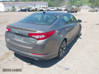 2012 Kia Optima SX with VIN 5XXGR4A64CG031334, listed as a IAAI auction lot 42045187 with 251,069 mi miles. Bid and sale history available at carsss.com. Image 4.