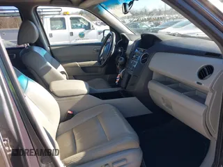 2015 Honda Pilot EX-L with VIN 5FNYF4H52FB070456, listed as a IAAI auction lot 41247639 with 182,998 mi miles and . Bid and sale history available at carsss.com. Image 5.