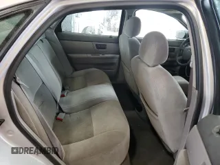 2005 Ford Taurus SE with VIN 1FAFP53215A133518, listed as a Copart auction lot 59615205 with 127,778 mi miles and Salvage title. Bid and sale history available at DreamBid. Image 10.