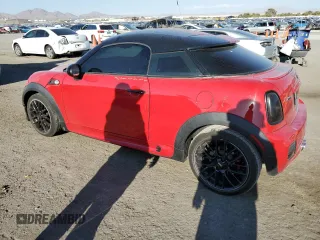 2015 MINI Coupe S z VIN WMWSX3C59FT409468, wystawiony jako Copart lot #71401384 z przebiegiem Nie podano mil oraz Szkody całkowita. Historia ofert i sprzedaży dostępna na DreamBid. Obrazek 2.