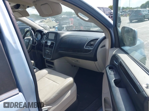 2013 Chrysler Town & Country Touring with VIN 2C4RC1BG3DR736862, listed as a IAAI auction lot 42131041 with 130,505 mi miles and . Bid and sale history available at DreamBid. Image 5.