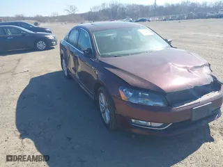 2013 Volkswagen Passat SEL Premium with VIN 1VWCP7A39DC052321, listed as a IAAI auction lot 41694214 with 151,931 mi miles. Bid and sale history available at carsss.com. Image 1.